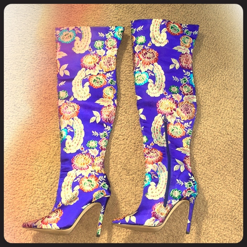 Blue silk “Privileged” boots.